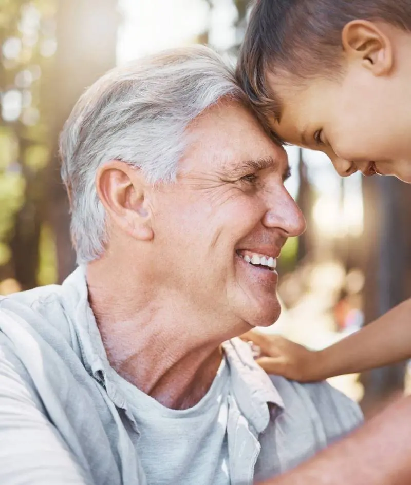 family-hiking-camping-with-boy-grandfather-bonding-outdoor-nature-together-while-adventure-spring-travel-face-senior-man-with-his-grandson-closeup-forest-woods(1)